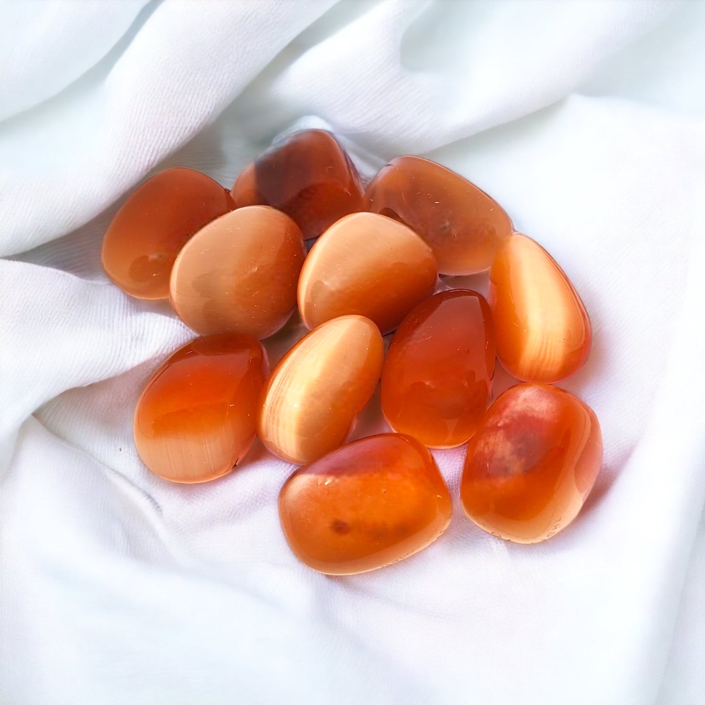 Orange Cat's Eye Tumble crystal for protection, creativity, and energy balance | Buy Orange Cat's Eye crystals online in Australia