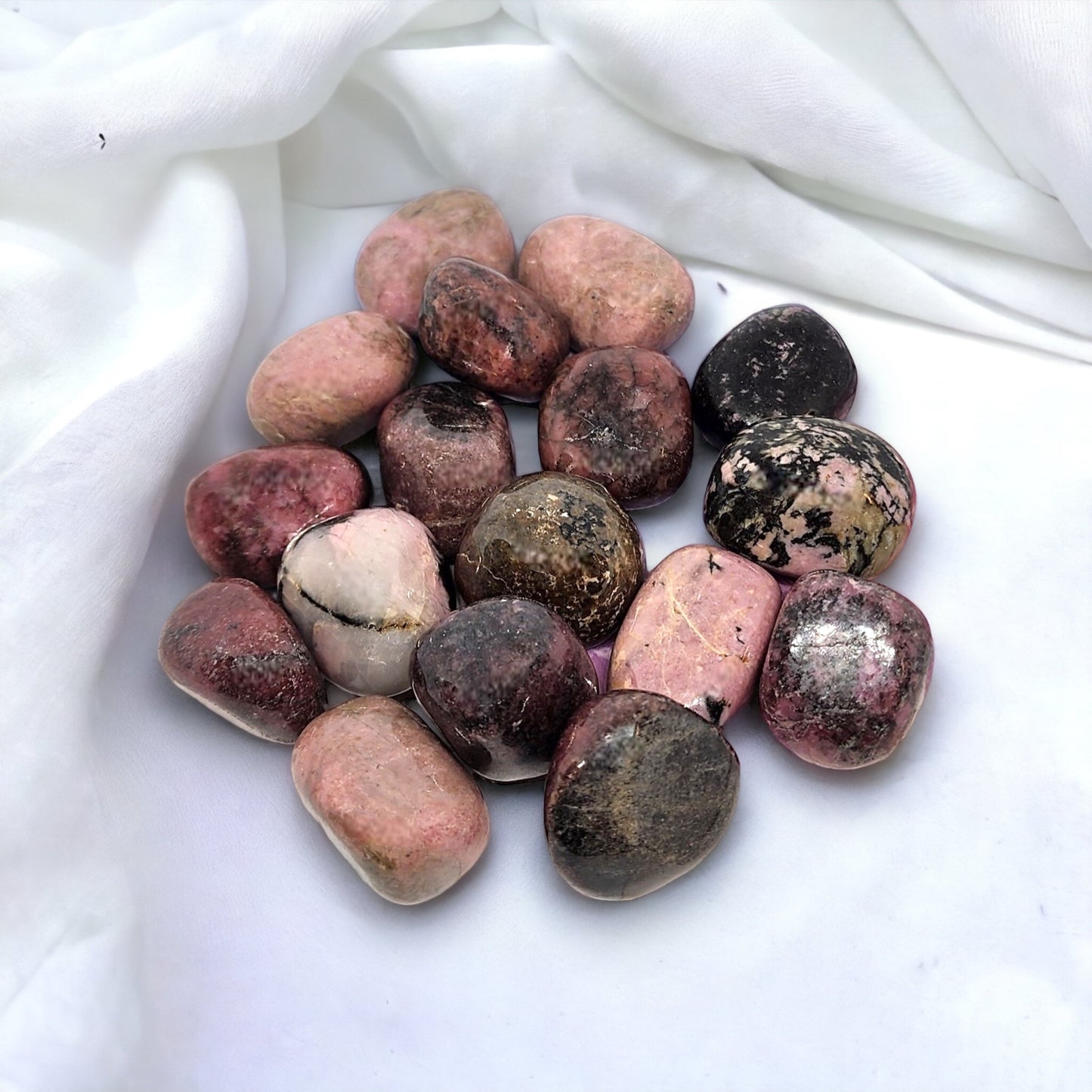 Rhodonite Tumble stone for emotional healing and self-love | Buy Rhodonite crystals online in Australia for heart chakra balancing