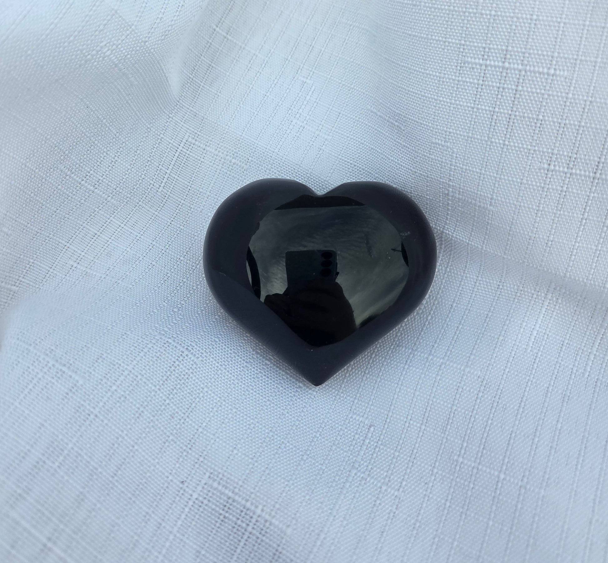 Black rainbow obsidian heart crystal at crystal shop in Australia mind soul sync