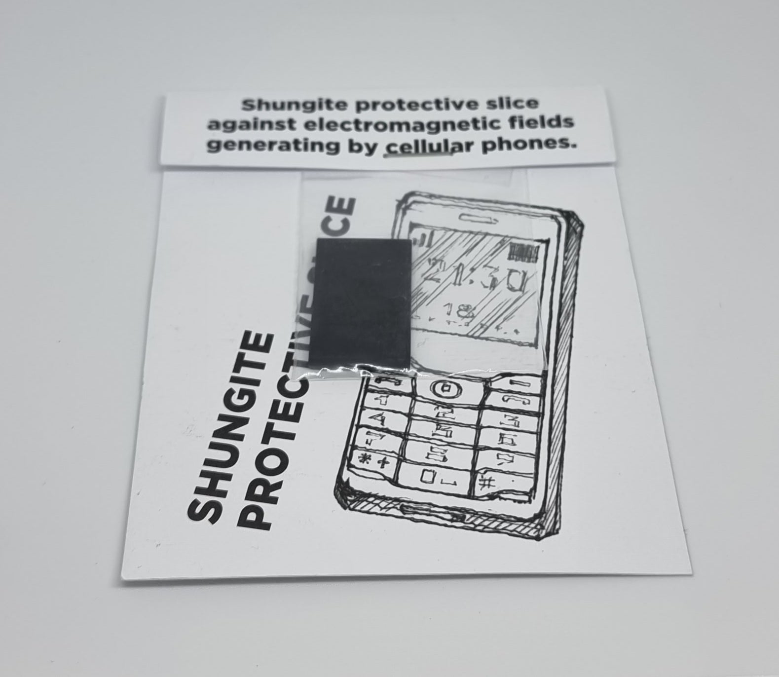 shungite protective phone slice used to protect against electromagnetic fields taken in crystal shop dubbo
