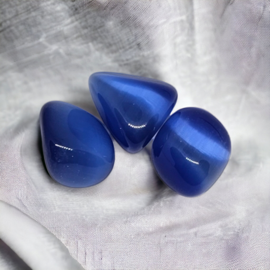 Blue crystal called blue cats eye. Sold at Mind Soul Sync crystal shop.