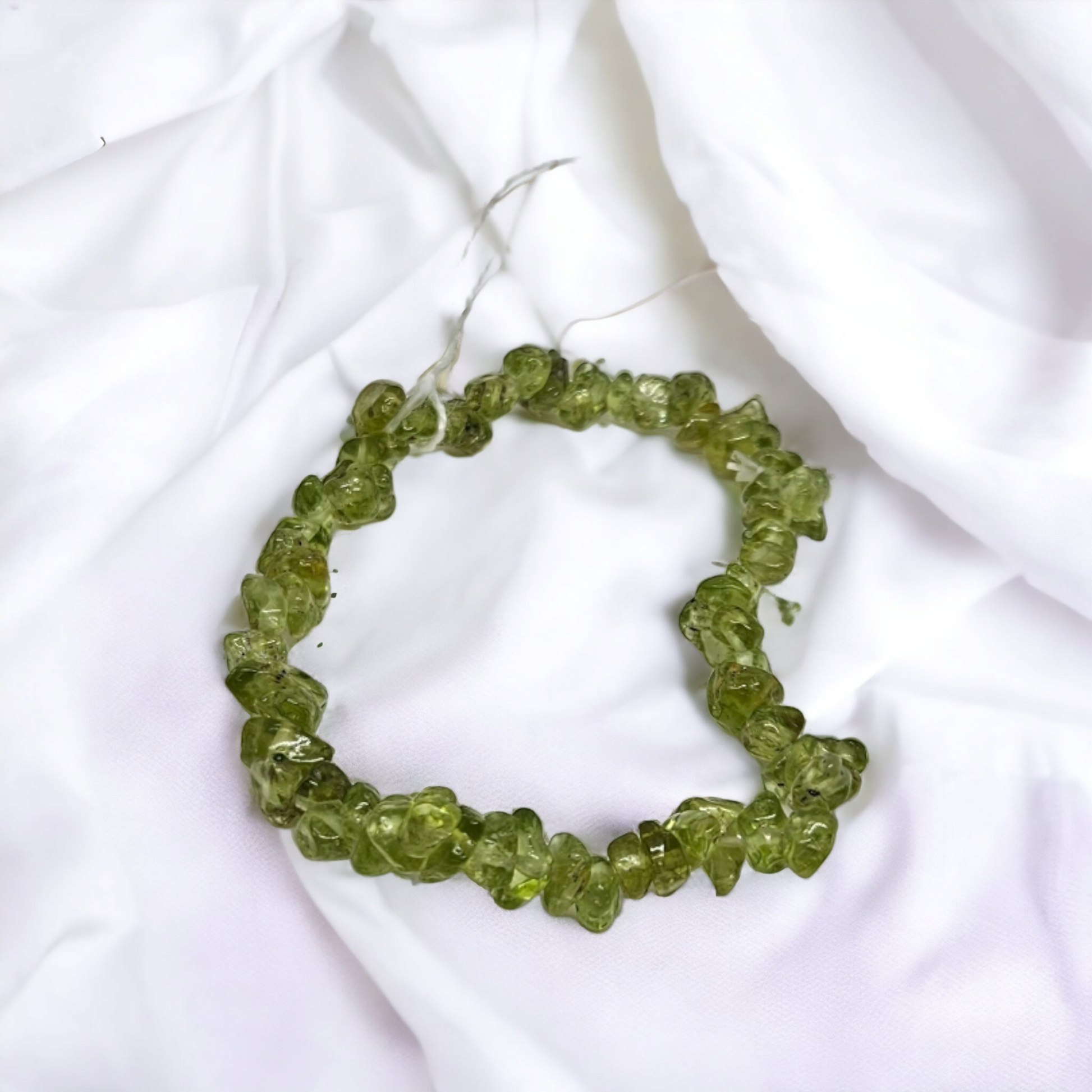 Green crystal jewellery called peridot sold at Mind Soul Sync crystal jewellery shop Australia.