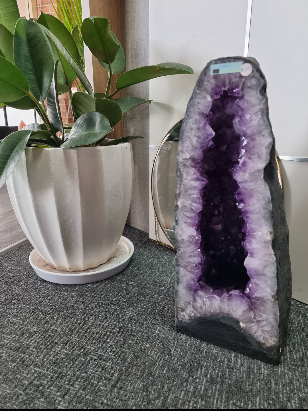 Amethyst cave sold at crystal store in Australia. A purple amethyst cave for healing and house balance.