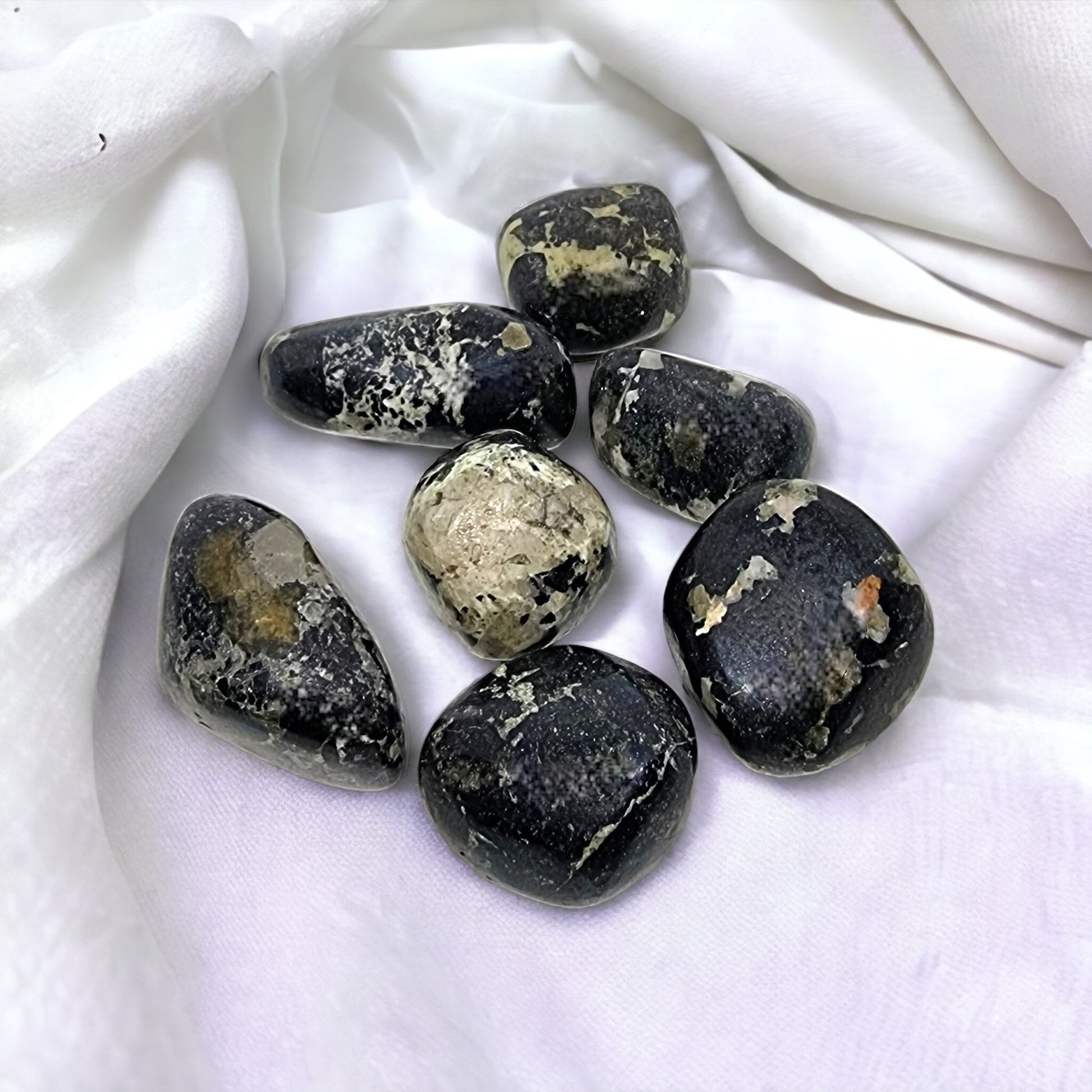 Covellite crystal tumbles with striking black quartz and crystal matrix taken in salt rooms dubbo